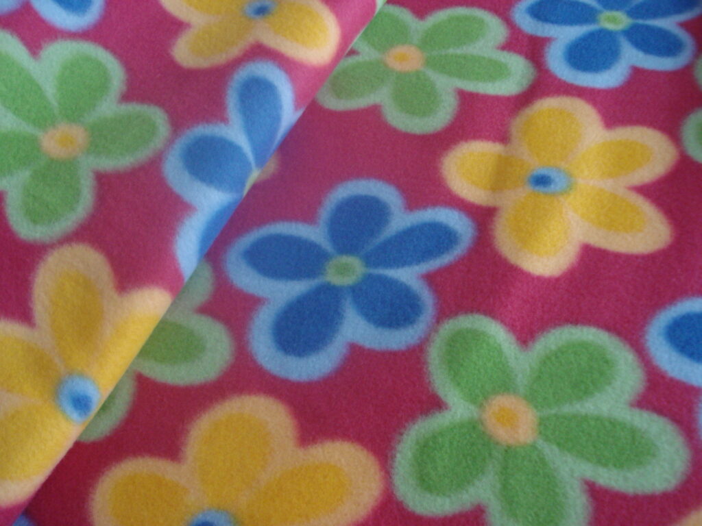 Tejido polar f/fucsia, estampado flores