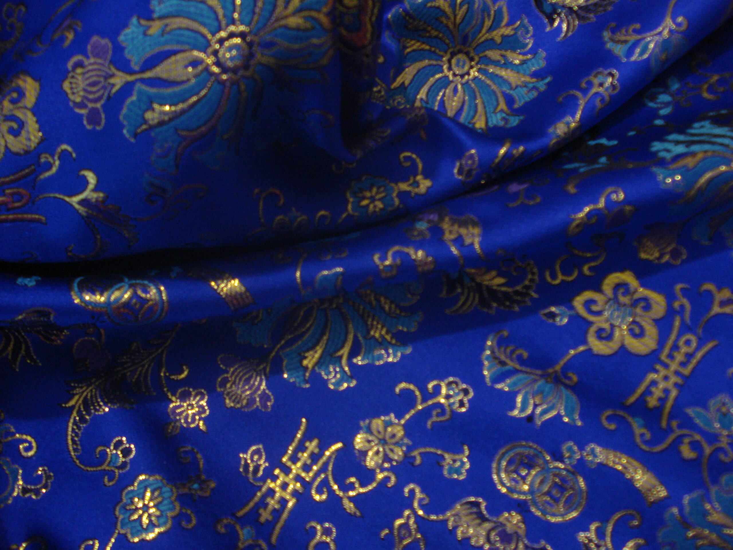 Tejido raso fondo azul eléctrico, estampado oriental