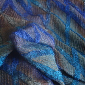 Tejido de rejilla con relieve en rizo c/ azules