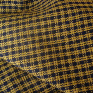 Tejido en poliéster-modal en cuadro tipo "vichy"