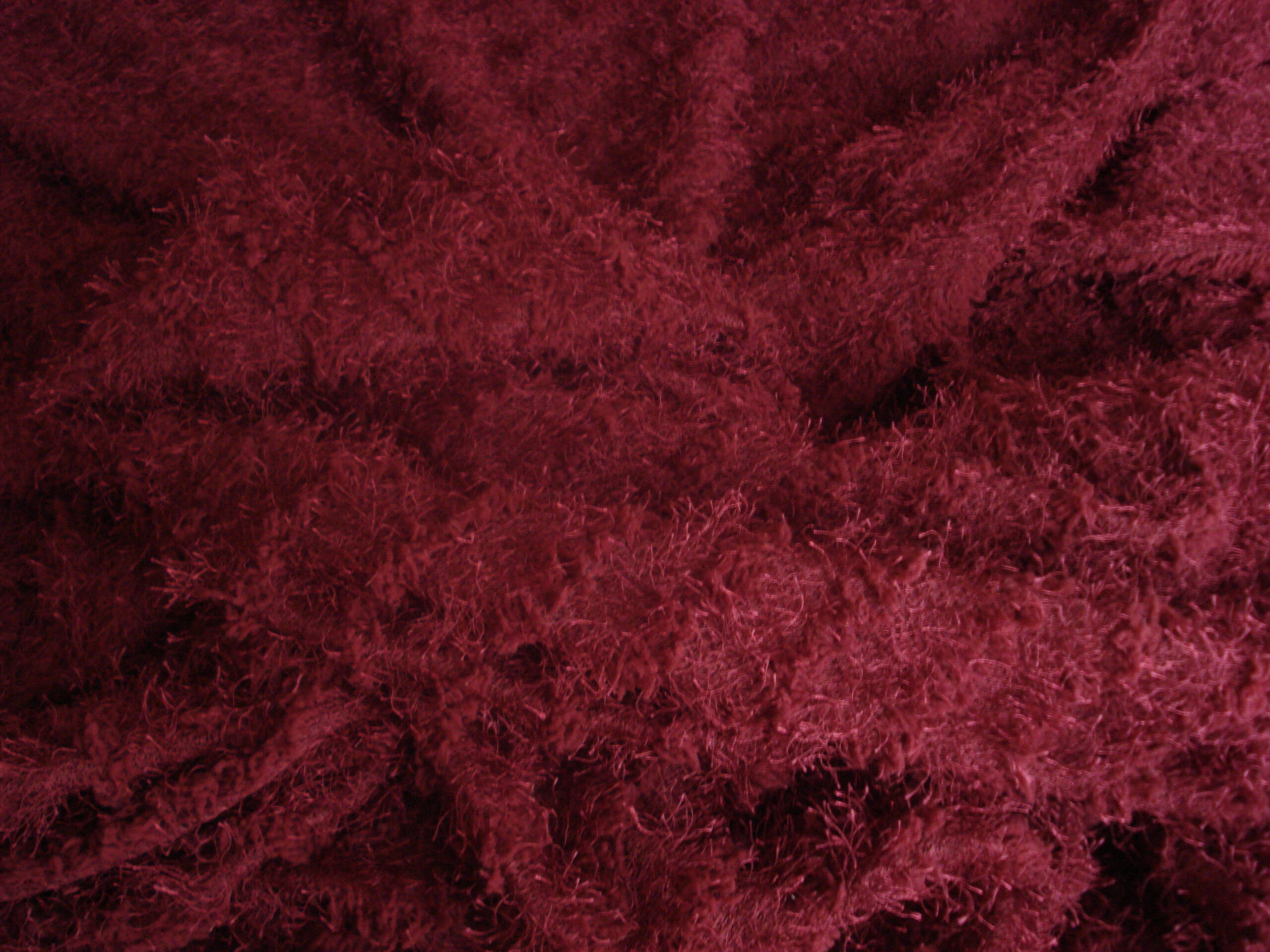 Tejido en punto granate con pelitos