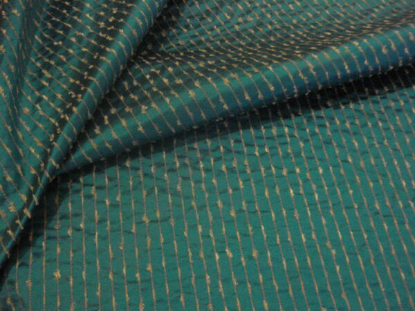 Seda salvaje con refuerzo c/turquesa, línea dorada deshilachada