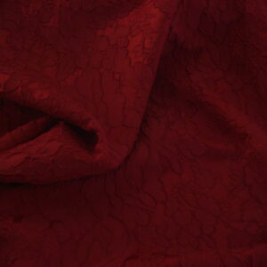 Tejido de fiesta 100% poliéster c/rojo brocado flores