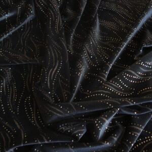 Tejido de punto aterciopelado c/negro con lentejuelas de colores