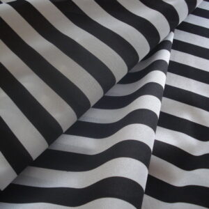 Rasete fondo blanco raya negra ancho 1.50mts.