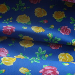 Popelín f/azulón c/flores amarillas ancho 1.60mts.