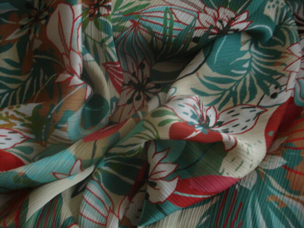 1,20mts. Tejido bambula estampado c/verdes, rojo ancho 1,50mts.