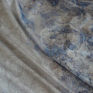 Tejido satinado en poliéster c/elastán dibujos grecas