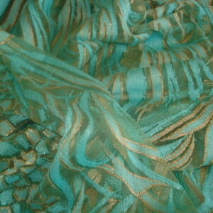 Tul c/dibujo de mosaico en orillo y resto líneas efecto algas ancho 1.36mts.