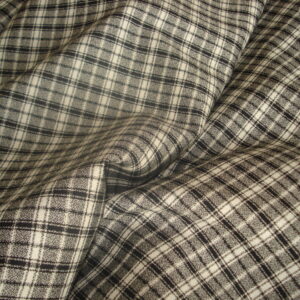 1,70mts. Tejido en cuadro escocés blanco y negro, ancho 1.52mts.