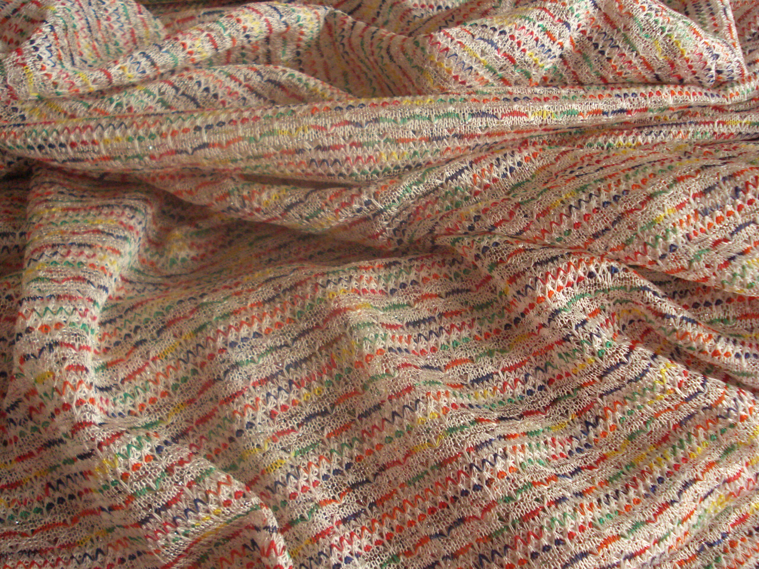 Tejido de punto abierto colores, ancho 1.54mts.