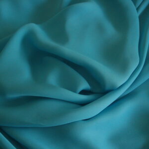 Tejido de gasa color turquesa, ancho 1.25mts.