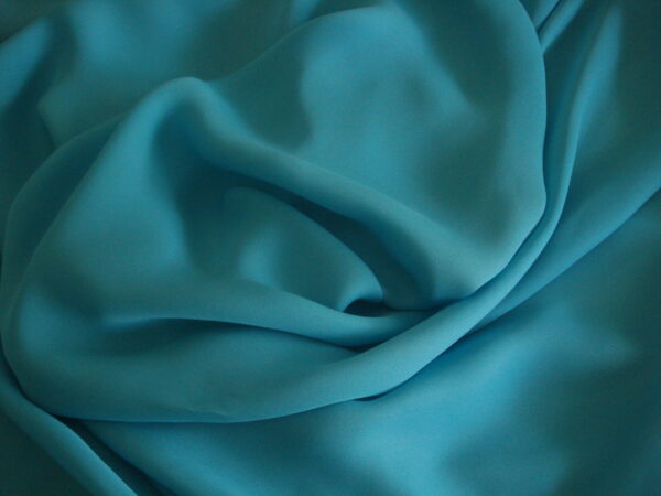 Tejido de gasa color turquesa, ancho 1.25mts.