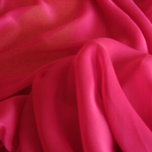 Tejido de muselina c/fucsia, ancho 1.50mts.