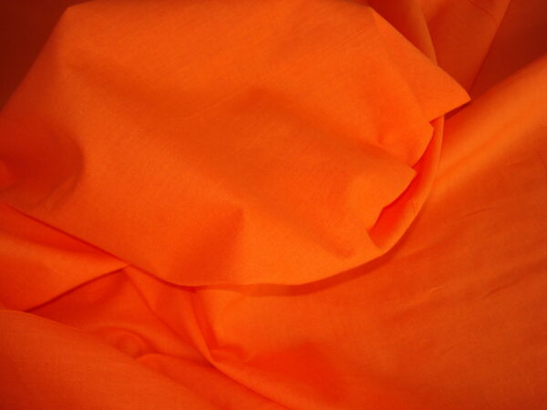 1,60mts. Tejido batista en algodón c/naranja, ancho 1.46mts.