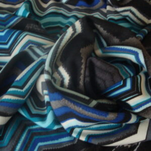 Tejido punto dibujo zigzag colores azules, ancho 1.42mts.