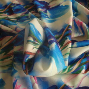 Tejido punto f/blanco estampado tulipanes azules, ancho 1.33mts.