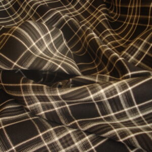 Tejido cuadros escoceses c/blanco, negro, gris, ancho 1.50mts.