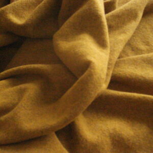 Tejido de punto de lana con elastomero c/ mostaza, ancho 1.40mts.