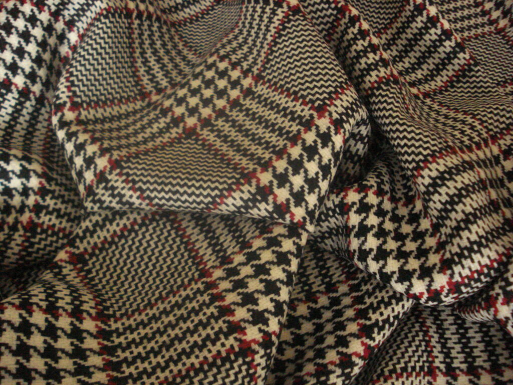 Tejido pata de gallo a cuadros blanco/negro/rojo, ancho 1.50mts.