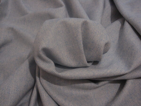 Tejido de lana c/azul cielo dibujo espiga, ancho1.52mts.