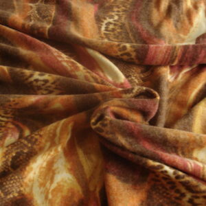 Tejido punto estampado print animal c/marrones-rosas, ancho 1.43mts.
