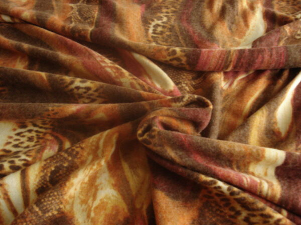 Tejido punto estampado print animal c/marrones-rosas, ancho 1.43mts.