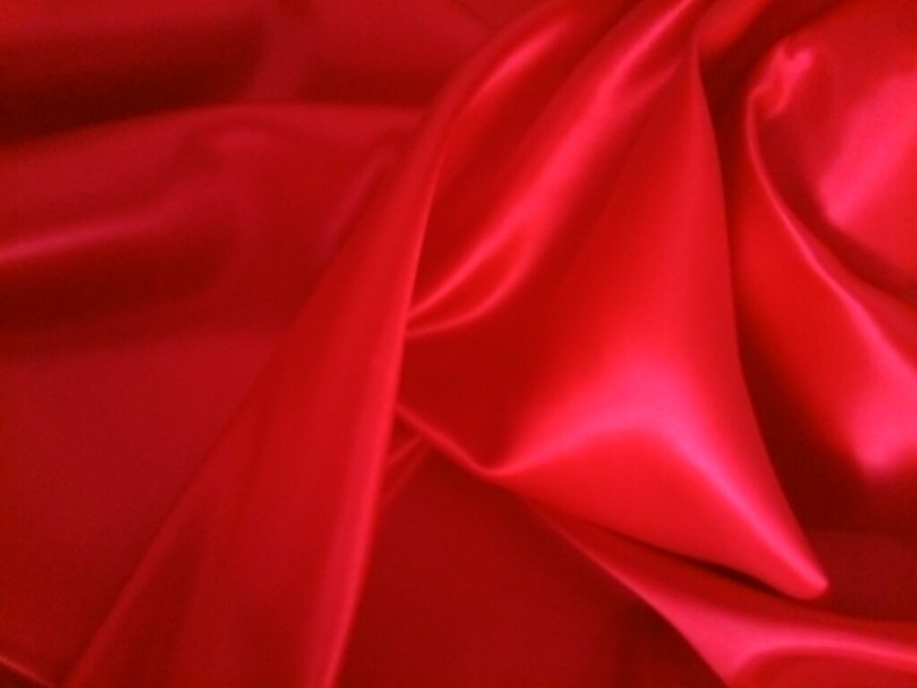 Tejido de raso carnaval color rojo