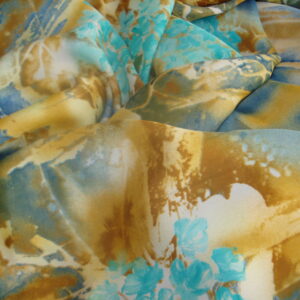 Tejido muselina estampado abstracto, azules y marrones, ancho 1,48mts.