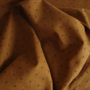 Tejido algodón 100% f/marrón con puntitos negros, ancho 1,39mts.
