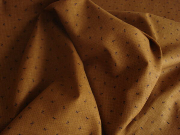 Tejido algodón 100% f/marrón con puntitos negros, ancho 1,39mts.