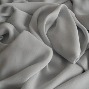 1,60mts. tejido gasa caída color azul grisaceo, ancho 1,50mts.