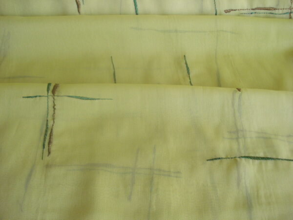 Tejido gasa f/ verde pistacho con bordados verde/marrón, ancho 1,45mts.