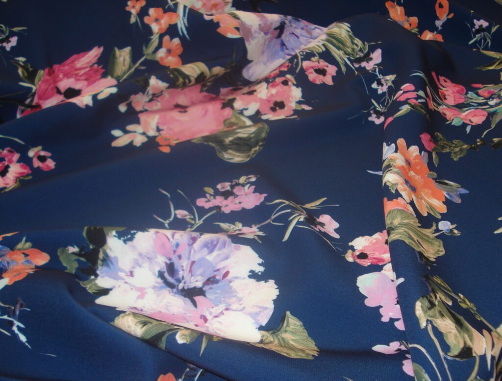 Tejido punto neopreno estampado flores, ancho 1,40mts.