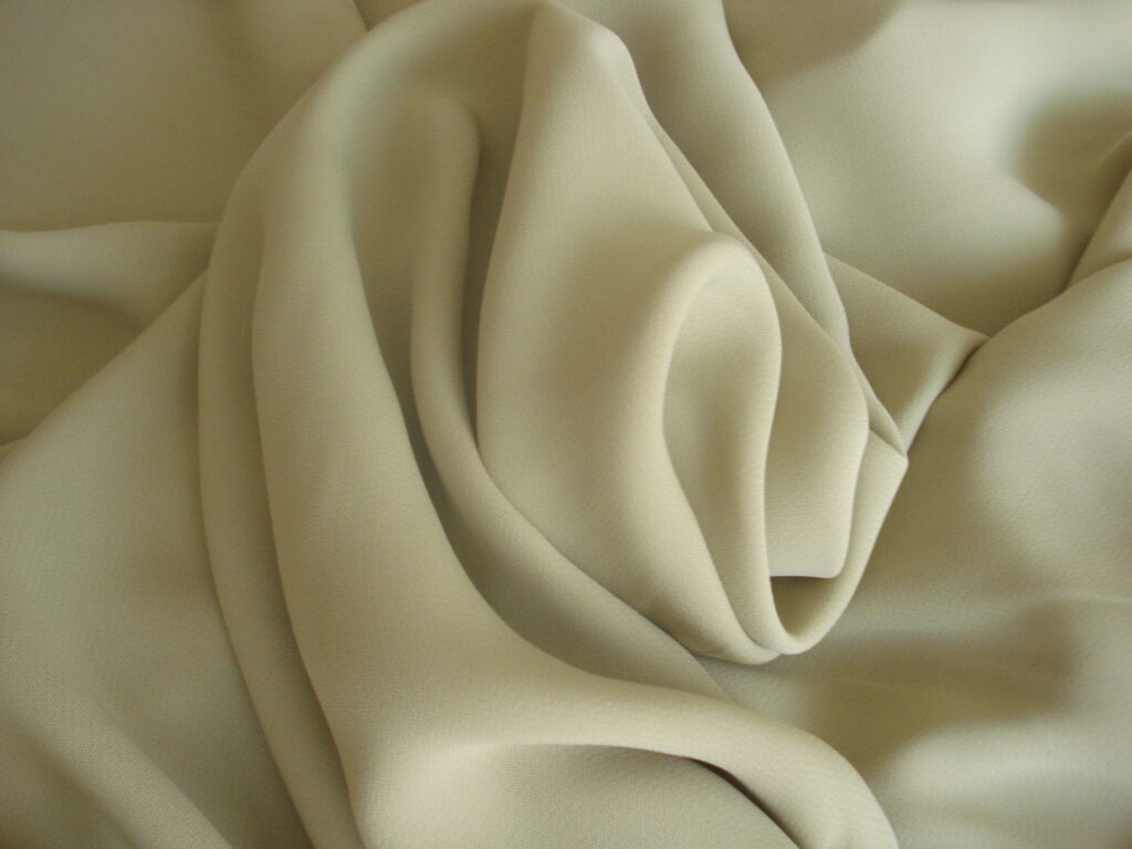 Tejido muselina satinado c/gris azulado, ancho 1,55mts.