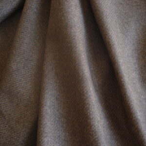 1,45mts. tejido jaspeado tonos marrones, ancho 1,52mts.