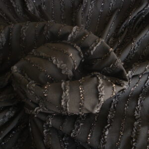 Tejido punto negro con cintas cosidas, ancho 1,50mts.