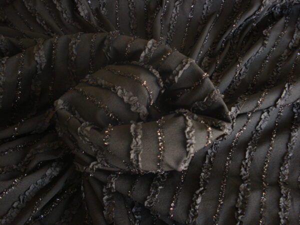 Tejido punto negro con cintas cosidas, ancho 1,50mts.