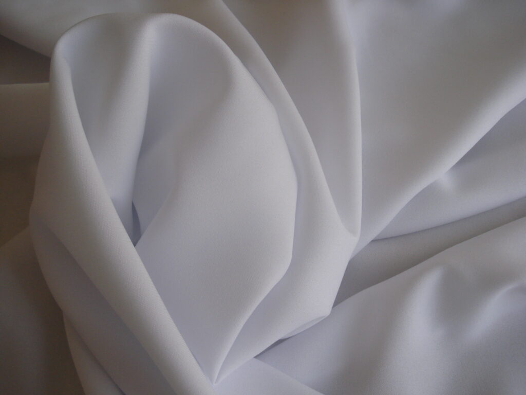 Tejido stretch blanco, ancho 1,50mts.